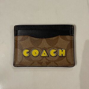 Coach Brown and Black Card Holder with Yellow Logo in Pac-Man font
